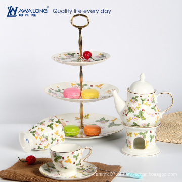 O copo de café novo da porcelana do osso com o jogo de chá inglês tradicional da porcelana